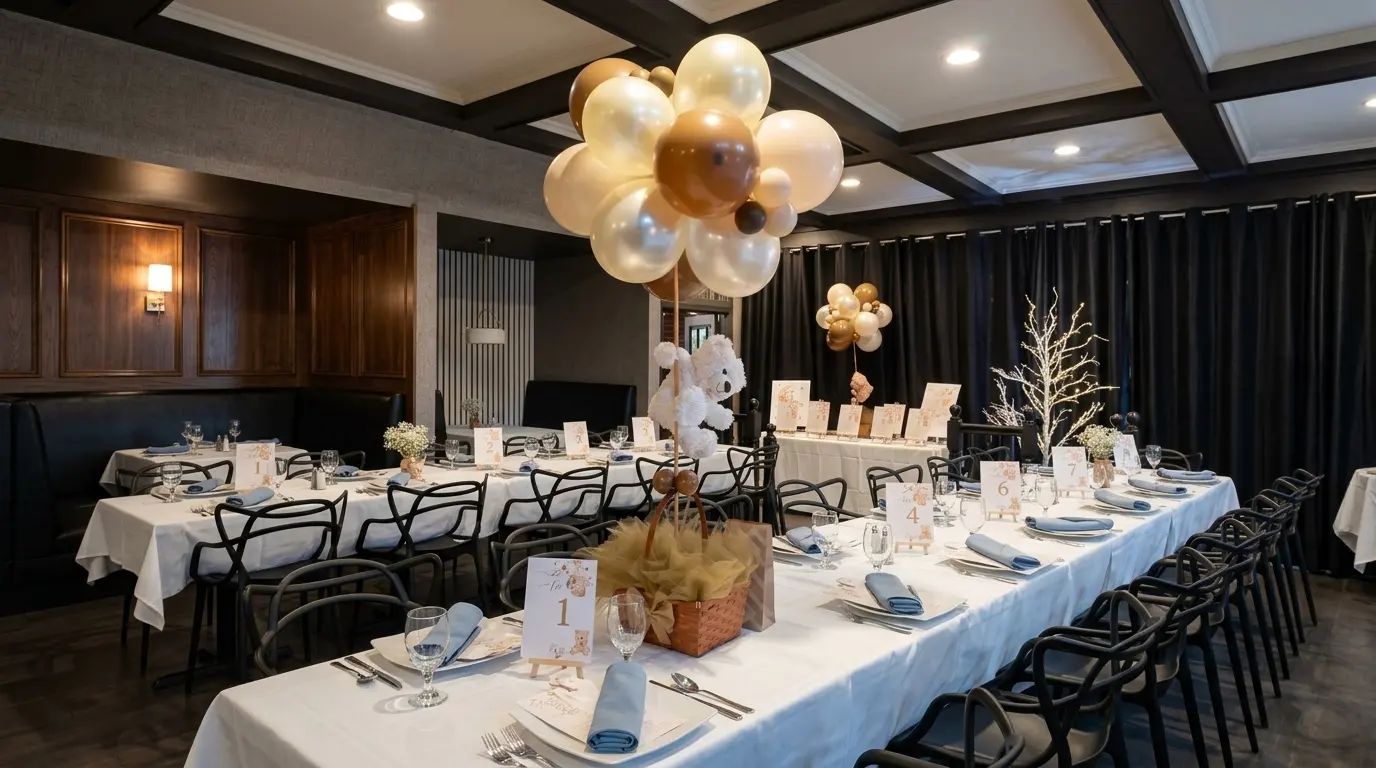 Pearl, gold and chocolate balloon centerpiece with a teddy bear basket on a baby shower banquet table, New Jersey