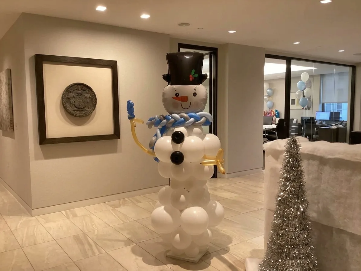 Snowman balloon sculpture with top hat and scarf for Christmas events in New Jersey
