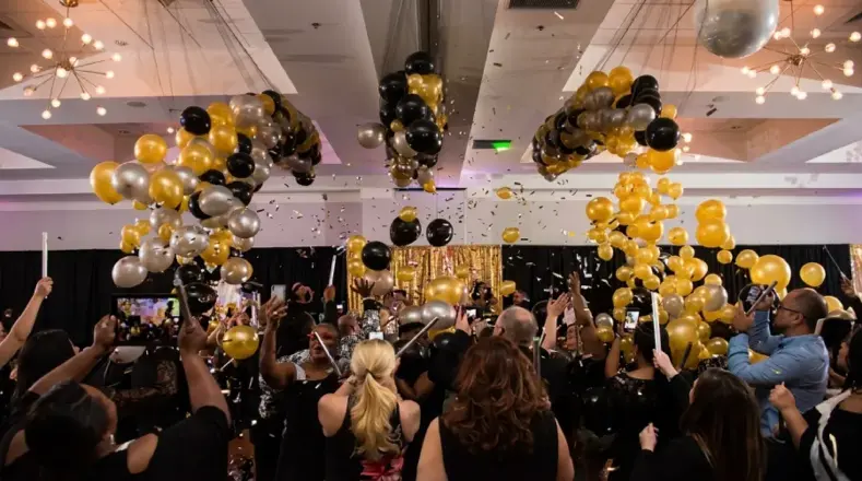 Gold and black balloons at a New Year party, New Jersey