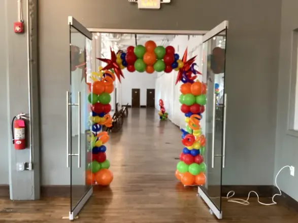 Colorful balloon arch at a doorway, New Jersey